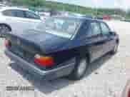 1990 Mercedes-Benz 300 E with VIN WDBEA30DXLB268200, listed as a IAAI auction lot 42595545 with 135,418 mi miles and . Bid and sale history available at DreamBid. Image 4.