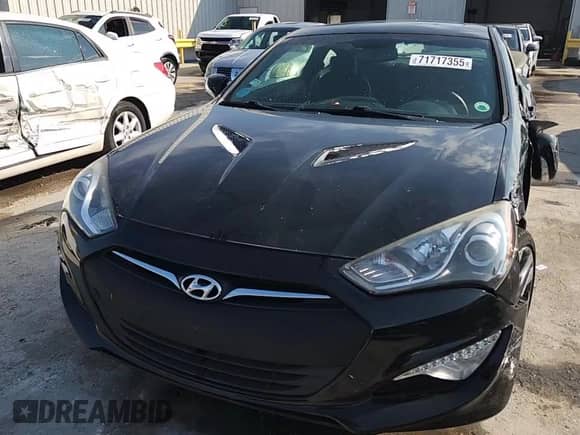 2014 Hyundai Genesis Coupe Ultimate с VIN KMHHU6KJ4EU115678, выставлен на аукционе Copart как лот 71717355 с пробегом 21 433 миль миль и Списание • Salvage title. История ставок и продаж доступна на DreamBid. Изображение 13.