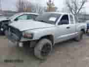 2007 Dodge Dakota SLT with VIN 1D7HW42P27S129431, listed as a IAAI auction lot 41673222 with 134,215 mi miles and . Bid and sale history available at DreamBid. Image 2.