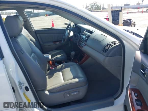2005 Toyota Camry XLE с VIN 4T1BF30K65U605453, выставлен на аукционе IAAI как лот 43523679 с пробегом 239 866 миль миль и . История ставок и продаж доступна на DreamBid. Изображение 5.