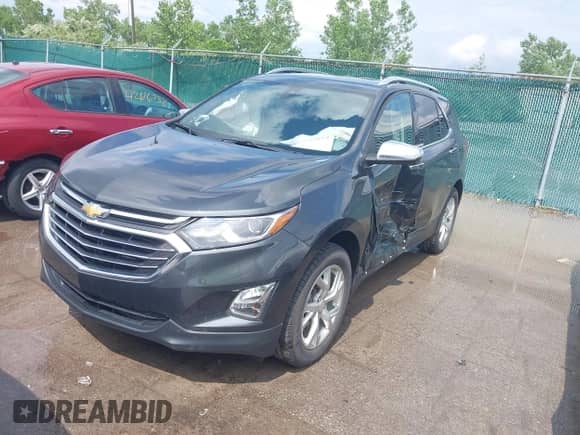 2021 Chevrolet Equinox Premier with VIN 2GNAXNEVXM6140093, listed as a IAAI auction lot 42627819 with 36,271 mi miles and . Bid and sale history available at DreamBid. Image 17.