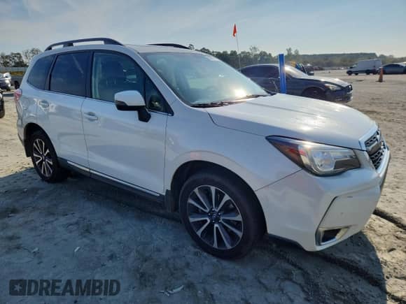 2017 Subaru Forester Touring z VIN JF2SJGWCXHH542608, wystawiony jako Copart lot #80816115 z przebiegiem 147 233 mil mil oraz Szkoda całkowita • Salvage title. Historia ofert i sprzedaży dostępna na DreamBid. Obrazek 4.