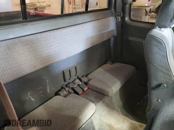 1997 Toyota Tacoma z VIN 4TAVL52N6VZ291508, wystawiony jako Copart lot #82747565 z przebiegiem 233 670 mil mil oraz Szkoda całkowita • Salvage title. Historia ofert i sprzedaży dostępna na DreamBid. Obrazek 10.