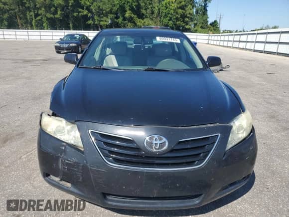 2007 Toyota Camry CE z VIN 4T1BE46K77U044845, wystawiony jako Copart lot #80031745 z przebiegiem 184 820 mil mil oraz Szkoda całkowita • Salvage title. Historia ofert i sprzedaży dostępna na DreamBid. Obrazek 5.
