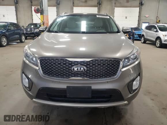 2016 Kia Sorento SXL z VIN 5XYPKDA52GG113608, wystawiony jako Copart lot #85586045 z przebiegiem 263 068 mil mil oraz Czysty tytuł • Clean title. Historia ofert i sprzedaży dostępna na DreamBid. Obrazek 5.