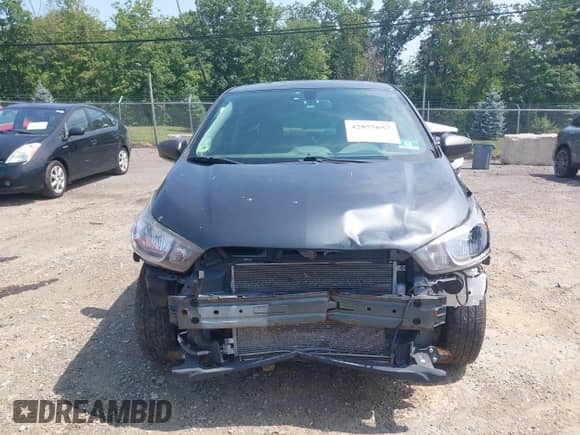 2017 Chevrolet Spark LS z VIN KL8CB6SA9HC702451, wystawiony jako IAAI lot #42855657 z przebiegiem 107 731 mil mil oraz . Historia ofert i sprzedaży dostępna na DreamBid. Obrazek 6.