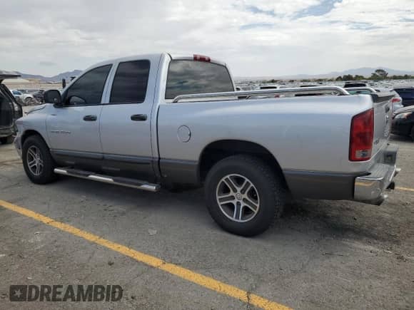 2003 Dodge 1500 ST with VIN 1D7HA18N83S125512, listed as a Copart auction lot 69581765 with 211,904 mi miles and Salvage title. Bid and sale history available at DreamBid. Image 2.