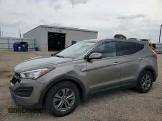 2015 Hyundai Santa Fe z VIN 5XYZT3LB0FG234784, wystawiony jako Copart lot #64021415 z przebiegiem 148 439 mil mil oraz Szkoda całkowita • Salvage title. Historia ofert i sprzedaży dostępna na DreamBid. Obrazek 1.