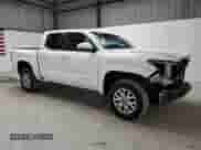 2024 Toyota Tacoma SR5 with VIN 3TMKB5FN2RM011207, listed as a Copart auction lot 80397465 with 28,515 mi miles and Clean title. Bid and sale history available at DreamBid. Image 4.