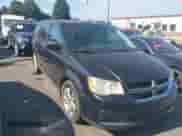 2013 Dodge Grand Caravan American Value with VIN 2C4RDGBG1DR601010, listed as a IAAI auction lot 43293889 with 156,529 mi miles and . Bid and sale history available at DreamBid. Image 1.