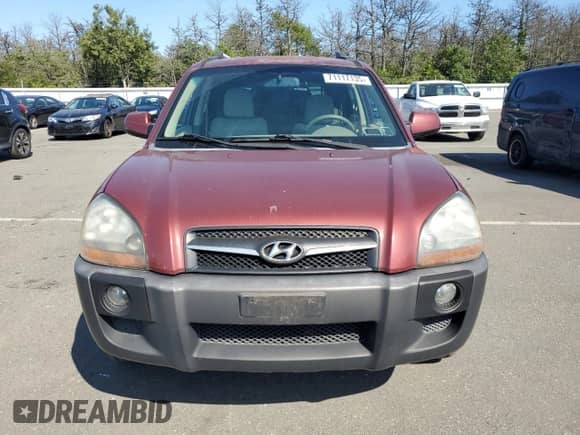 2009 Hyundai Tucson SE with VIN KM8JN12D59U969564, listed as a Copart auction lot 71117135 with 165,767 mi miles and Clean title. Bid and sale history available at DreamBid. Image 5.