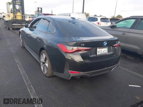 2023 BMW i4 eDrive35 with VIN WBY43AW02PFP50656, listed as a IAAI auction lot 41776504 with 18,024 mi miles and . Bid and sale history available at DreamBid. Image 3.