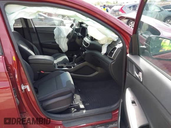 2019 Hyundai Tucson Sport z VIN KM8J33AL4KU928830, wystawiony jako IAAI lot #42104966 z przebiegiem 107 350 mil mil oraz . Historia ofert i sprzedaży dostępna na DreamBid. Obrazek 5.