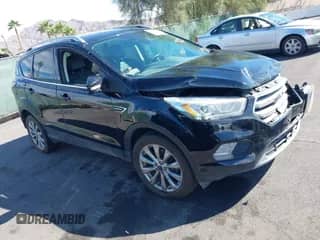 2017 Ford Escape Titanium z VIN 1FMCU9J99HUE62219, wystawiony jako IAAI lot #43282802 z przebiegiem 92 510 mil mil oraz . Historia ofert i sprzedaży dostępna na DreamBid. Obrazek 1.