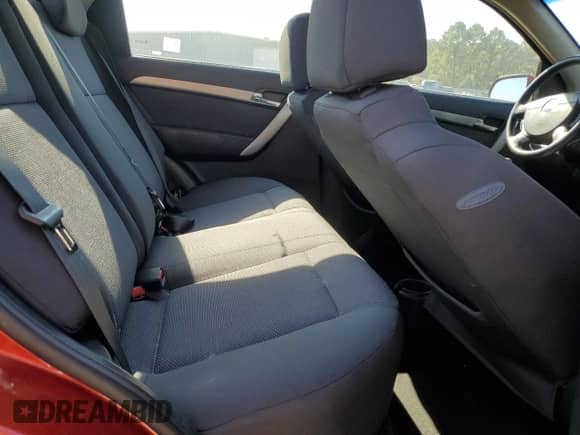 2011 Chevrolet Aveo 1LT z VIN KL1TD5DE5BB138149, wystawiony jako Copart lot #77862674 z przebiegiem 51 344 mil mil oraz Czysty tytuł • Clean title. Historia ofert i sprzedaży dostępna na DreamBid. Obrazek 10.