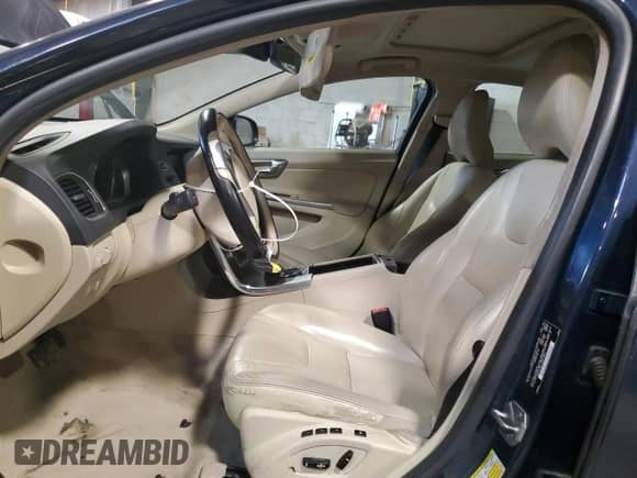 2015 Volvo S60 T5 Drive-E Premier with VIN YV126MFK9F1354636, listed as a Copart auction lot 61228855 with 143,125 mi miles and Salvage title. Bid and sale history available at DreamBid. Image 7.