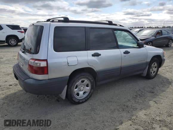 2002 Subaru Forester L with VIN JF1SF63522G747391, listed as a Copart auction lot 72027955 with 248,177 mi miles and Clean title. Bid and sale history available at DreamBid. Image 3.