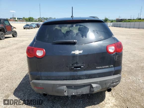 2011 Chevrolet Traverse LTZ с VIN 1GNKRLED6BJ415596, выставлен на аукционе Copart как лот 68555375 с пробегом Не указан миль и На запчасти • Non repairable. История ставок и продаж доступна на DreamBid. Изображение 6.