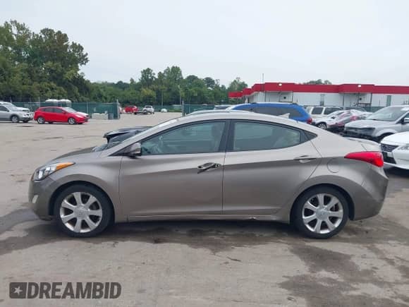 2012 Hyundai Elantra Limited с VIN 5NPDH4AE4CH106017, выставлен на аукционе IAAI как лот 43307970 с пробегом 199 783 миль миль и . История ставок и продаж доступна на DreamBid. Изображение 14.