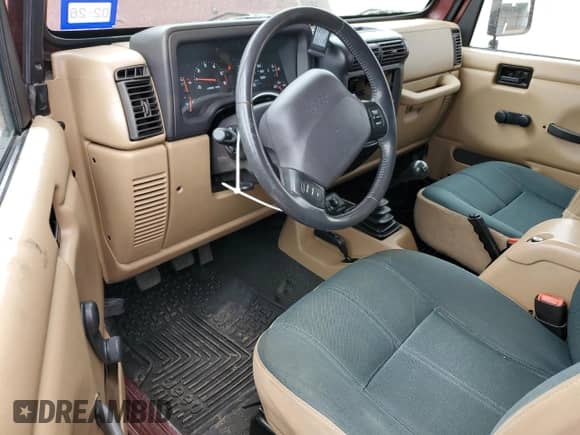 2002 Jeep Wrangler Sahara with VIN 1J4FA59S32P746410, listed as a Copart auction lot 56403075 with 147,968 mi miles and Salvage title. Bid and sale history available at DreamBid. Image 8.