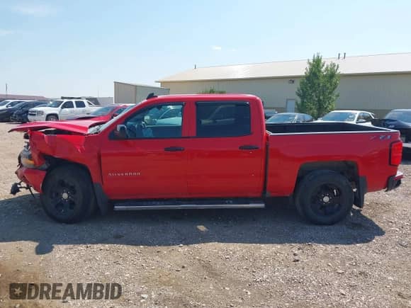 2018 Chevrolet Silverado 1500 LT with VIN 3GCUKREC6JG142529, listed as a IAAI auction lot 43126958 with 117,342 mi miles and . Bid and sale history available at DreamBid. Image 14.