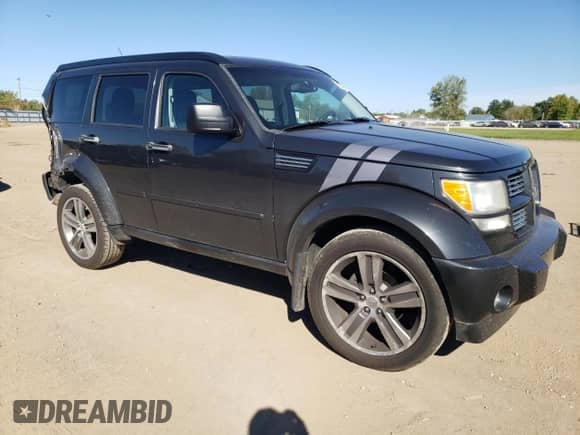 2011 Dodge Nitro Shock с VIN 1D4PU7GX0BW587432, выставлен на аукционе Copart как лот 84634685 с пробегом 184 470 миль миль и Списание • Salvage title. История ставок и продаж доступна на DreamBid. Изображение 4.