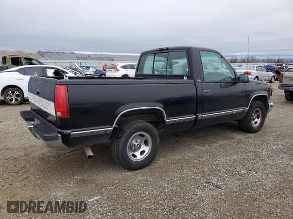 1997 Chevrolet Silverado 1500 with VIN 1GCEC14R5VZ187489, listed as a Copart auction lot 87211824 with 211,353 mi miles and Clean title. Bid and sale history available at DreamBid. Image 3.