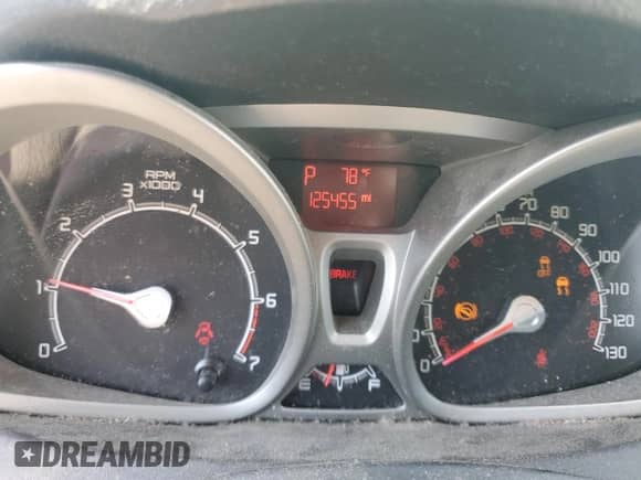 2012 Ford Fiesta SES с VIN 3FADP4FJ8CM128613, выставлен на аукционе Copart как лот 47583485 с пробегом 125 455 миль миль и Списание • Salvage title. История ставок и продаж доступна на DreamBid. Изображение 9.