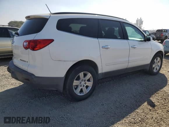 2012 Chevrolet Traverse 1LT z VIN 1GNKRGED0CJ138419, wystawiony jako Copart lot #90119345 z przebiegiem 128 476 mil mil oraz Czysty tytuł • Clean title. Historia ofert i sprzedaży dostępna na DreamBid. Obrazek 3.