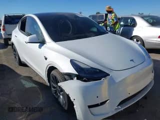 2022 Tesla Model Y Performance with VIN 7SAYGDEFXNF484838, listed as a IAAI auction lot 43492940 with 8,729 mi miles and . Bid and sale history available at DreamBid. Image 1.