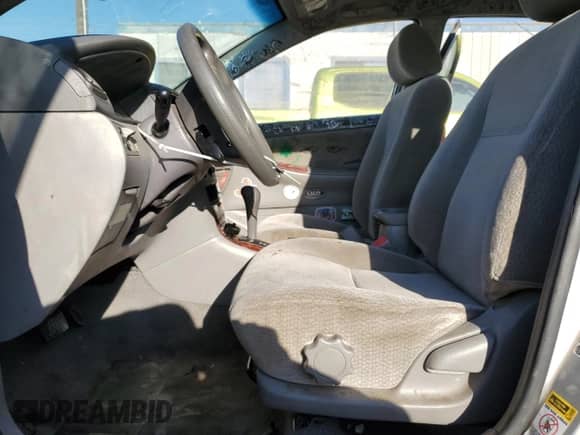 2004 Toyota Corolla LE с VIN 1NXBR38E04Z244015, выставлен на аукционе Copart как лот 82288095 с пробегом 149 354 миль миль и Списание • Salvage title. История ставок и продаж доступна на DreamBid. Изображение 7.