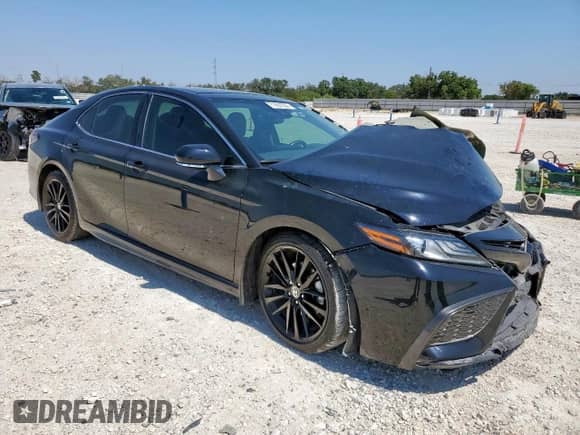 2021 Toyota Camry XSE with VIN 4T1K61AK9MU402834, listed as a Copart auction lot 71657335 with 77,028 mi miles and Salvage title. Bid and sale history available at DreamBid. Image 4.