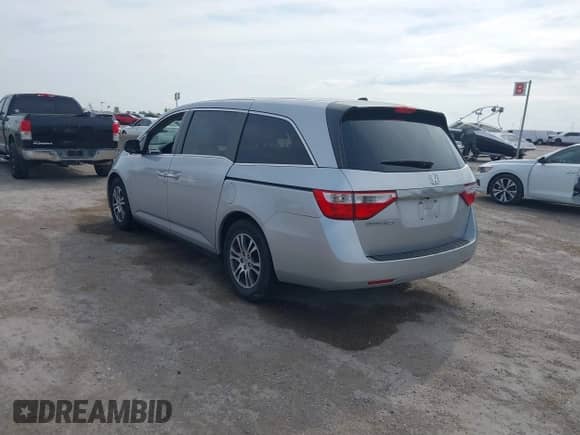 2013 Honda Odyssey EX-L z VIN 5FNRL5H69DB022042, wystawiony jako IAAI lot #41902796 z przebiegiem 178 198 mil mil oraz . Historia ofert i sprzedaży dostępna na DreamBid. Obrazek 3.