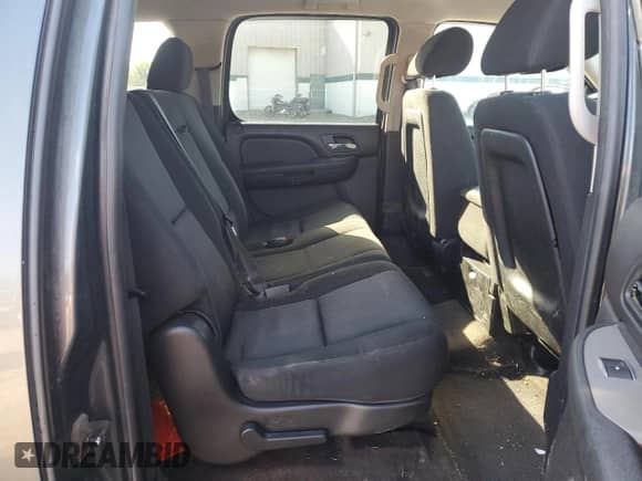 2011 Chevrolet Suburban с VIN 1GNSC5E00BR228320, выставлен на аукционе Copart как лот 74813024 с пробегом 178 020 миль миль и Списание • Salvage title. История ставок и продаж доступна на DreamBid. Изображение 11.