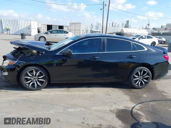 2020 Chevrolet Malibu RS with VIN 1G1ZG5STXLF135018, listed as a IAAI auction lot 43195958 with 94,145 mi miles and . Bid and sale history available at DreamBid. Image 14.
