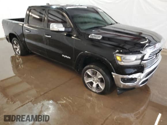 2020 Ram 1500 Laramie z VIN 1C6RREJT0LN238318, wystawiony jako Copart lot #52571805 z przebiegiem Nie podano mil oraz Czysty tytuł • Clean title. Historia ofert i sprzedaży dostępna na DreamBid. Obrazek 4.