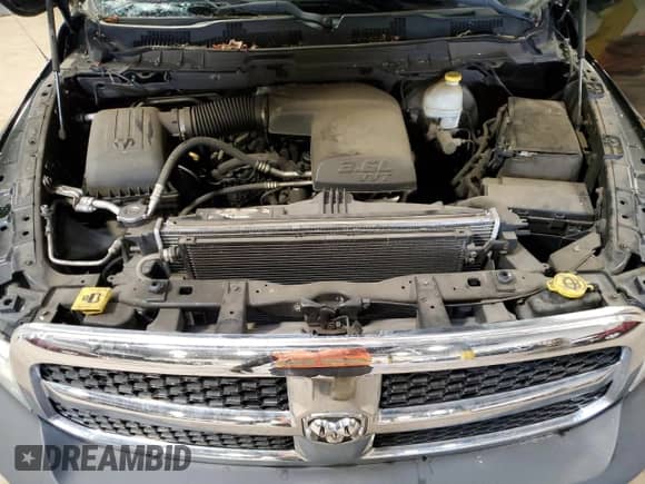 2013 Ram 1500 Tradesman with VIN 1C6RR6KG9DS538854, listed as a Copart auction lot 63003105 with 128,465 mi miles and Salvage title. Bid and sale history available at DreamBid. Image 11.