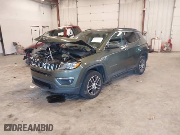 2018 Jeep Compass Latitude with VIN 3C4NJDBBXJT301159, listed as a IAAI auction lot 43319630 with 98,956 mi miles and . Bid and sale history available at DreamBid. Image 17.