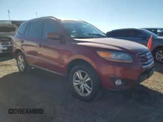 2011 Hyundai Santa Fe SE z VIN 5XYZHDAG2BG049457, wystawiony jako Copart lot #90379305 z przebiegiem 246 451 mil mil oraz Czysty tytuł • Clean title. Historia ofert i sprzedaży dostępna na DreamBid. Obrazek 4.