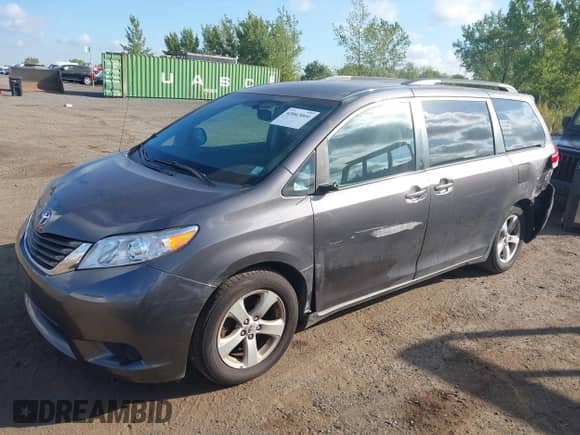 2012 Toyota Sienna LE AAS with VIN 5TDKK3DC2CS215910, listed as a IAAI auction lot 43063000 with 169,580 mi miles and . Bid and sale history available at DreamBid. Image 17.