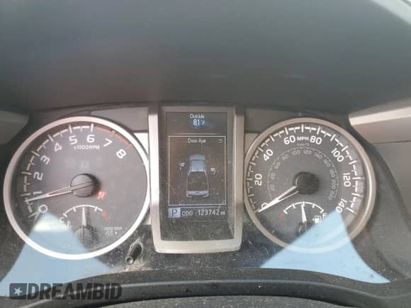 2016 Toyota Tacoma SR5 z VIN 5TFAZ5CN1GX004509, wystawiony jako Copart lot #84719715 z przebiegiem 123 742 mil mil oraz Szkoda całkowita • Salvage title. Historia ofert i sprzedaży dostępna na DreamBid. Obrazek 9.