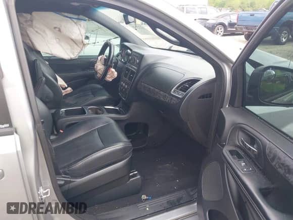 2014 Dodge Grand Caravan SXT 30th Anniversary z VIN 2C4RDGCGXER276311, wystawiony jako IAAI lot #42227530 z przebiegiem 132 787 mil mil oraz . Historia ofert i sprzedaży dostępna na DreamBid. Obrazek 5.