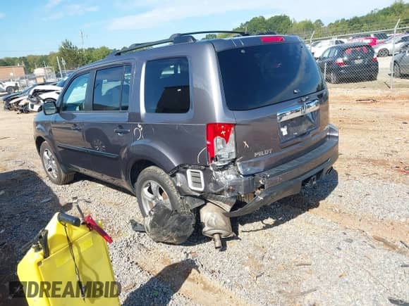 2014 Honda Pilot EX-L z VIN 5FNYF4H58EB016710, wystawiony jako IAAI lot #43349794 z przebiegiem 163 710 mil mil oraz . Historia ofert i sprzedaży dostępna na DreamBid. Obrazek 3.