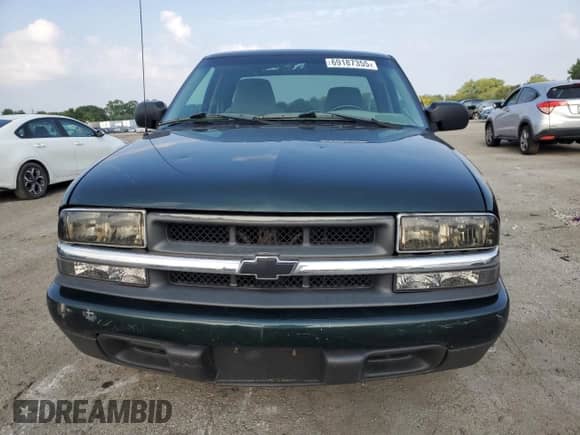 2002 Chevrolet S-10 LS z VIN 1GCCS195428118097, wystawiony jako Copart lot #69187355 z przebiegiem 104 416 mil mil oraz Szkoda całkowita • Salvage title. Historia ofert i sprzedaży dostępna na DreamBid. Obrazek 5.