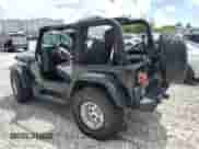 2004 Jeep Wrangler SE with VIN 1J4FA29134P790979, listed as a Copart auction lot 65434505 with 101,476 mi miles and Clean title. Bid and sale history available at DreamBid. Image 2.