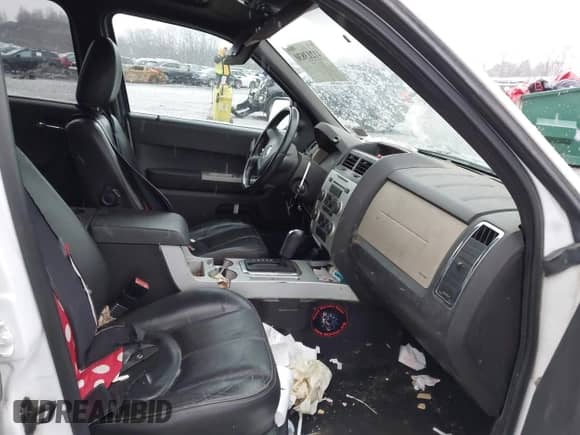 2008 Mercury Mariner with VIN 4M2CU91128KJ03668, listed as a IAAI auction lot 41213830 with 240,480 mi miles and . Bid and sale history available at DreamBid. Image 5.