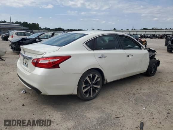 2016 Nissan Altima SR z VIN 1N4AL3AP6GC227944, wystawiony jako Copart lot #71069345 z przebiegiem 122 699 mil mil oraz Szkoda całkowita • Salvage title. Historia ofert i sprzedaży dostępna na DreamBid. Obrazek 3.