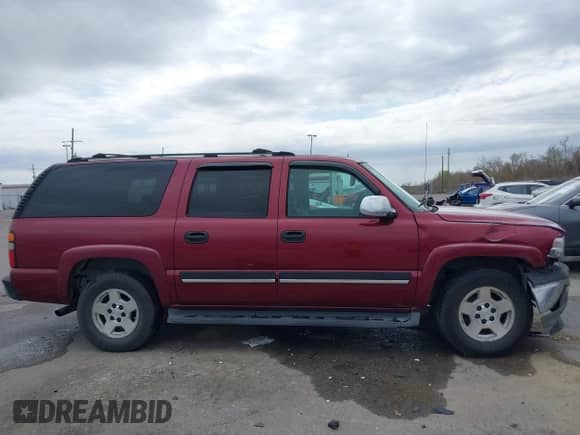 2005 Chevrolet Suburban LT with VIN 3GNEC16Z15G205829, listed as a IAAI auction lot 41690689 with 196,504 mi miles and . Bid and sale history available at DreamBid. Image 13.