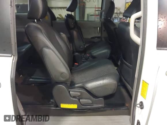 2014 Toyota Sienna SE with VIN 5TDXK3DC7ES497390, listed as a IAAI auction lot 42037096 with 169,127 mi miles and . Bid and sale history available at DreamBid. Image 8.