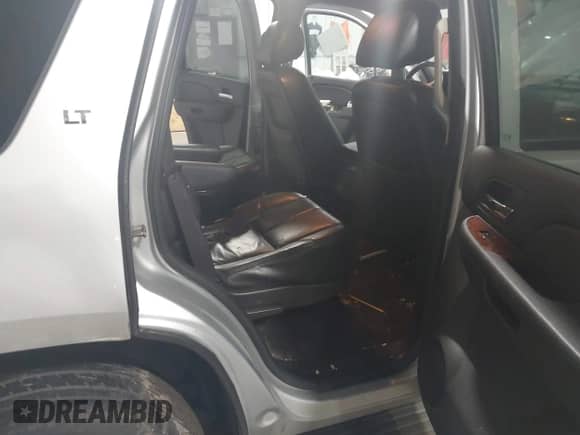 2012 Chevrolet Tahoe LT with VIN 1GNSCBE01CR326465, listed as a IAAI auction lot 42183450 with 220,129 mi miles and . Bid and sale history available at DreamBid. Image 8.